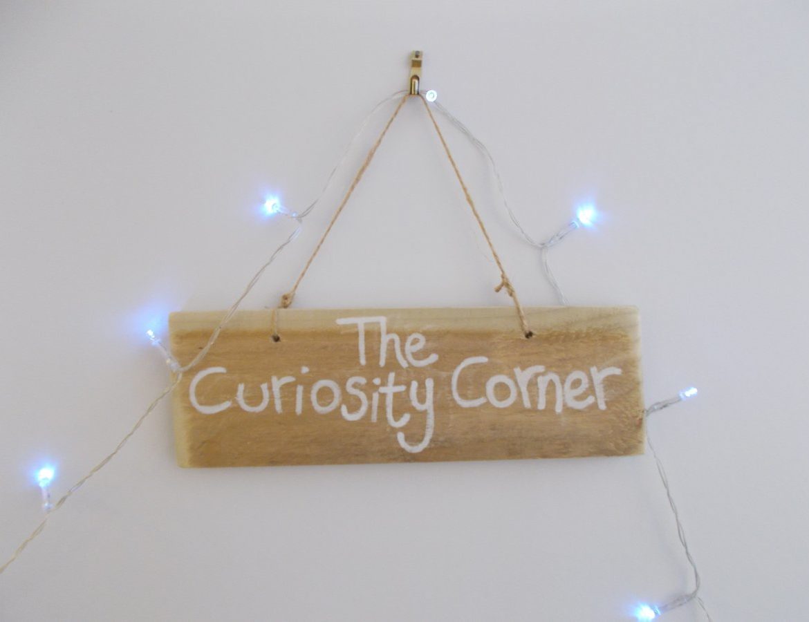 Curiosity Corner Sign