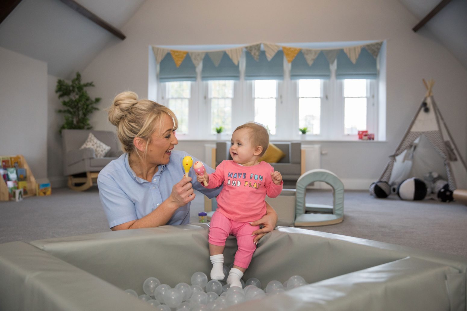 Acorns Nurseries A woman and a baby enjoy a toy in a ball pit in the Acorns room, where child registration ensures every little one feels right at home in this spacious, light-filled haven. Acorns Nurseries A woman and a baby enjoy a toy in a ball pit in the Acorns room, where child registration ensures every little one feels right at home in this spacious, light-filled haven.
